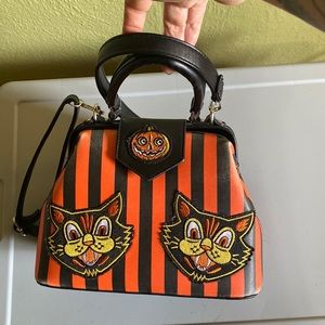 Orange and black Sourpuss purse